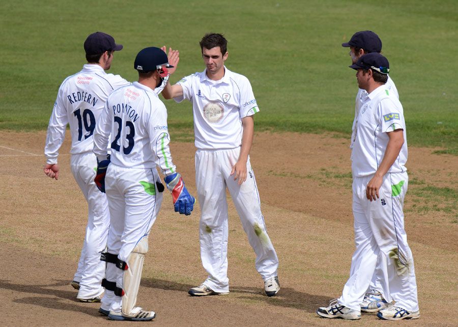 David Wainwright is congratulated by his team-mates on a dismissal