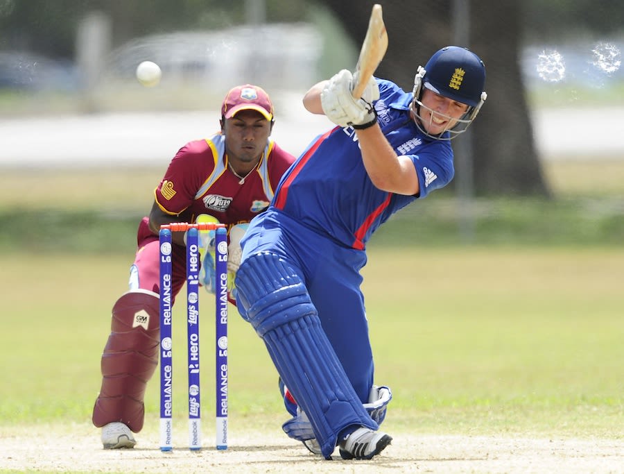 Sam Wood slogs towards mid-wicket