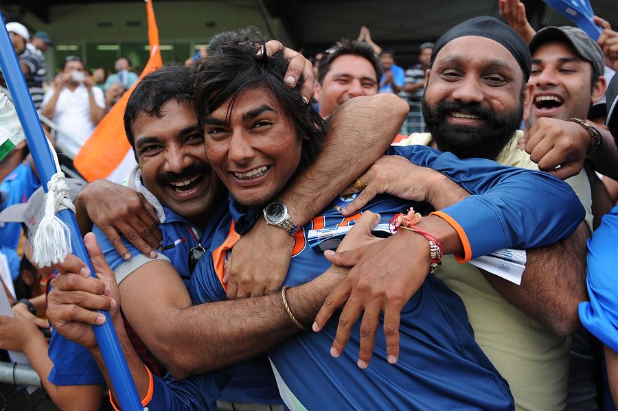 Kamal Passi celebrates the win with some Indian fans