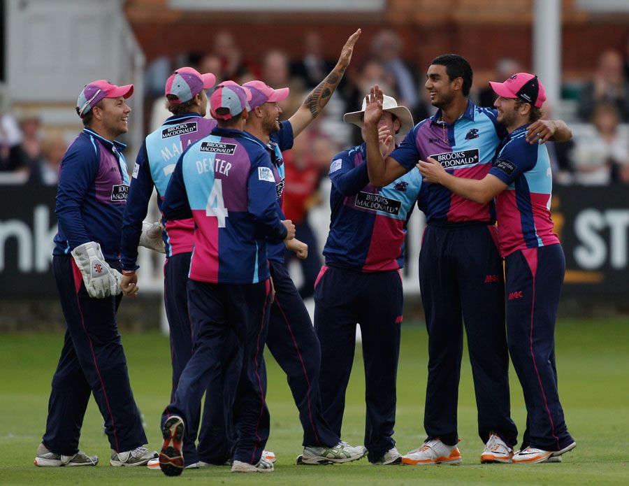 Gurjit Sandhu is congratulated by his team-mates