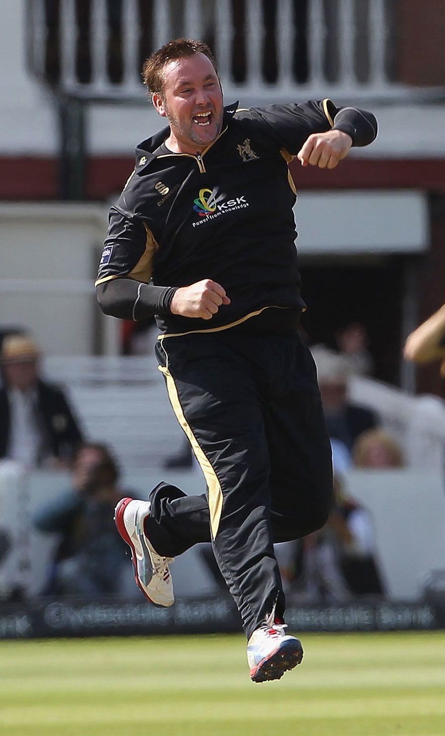 Ian Blackwell celebrates the wicket of Neil McKenzie