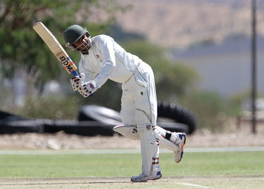 Tanmay Mishra works to leg during his hundred