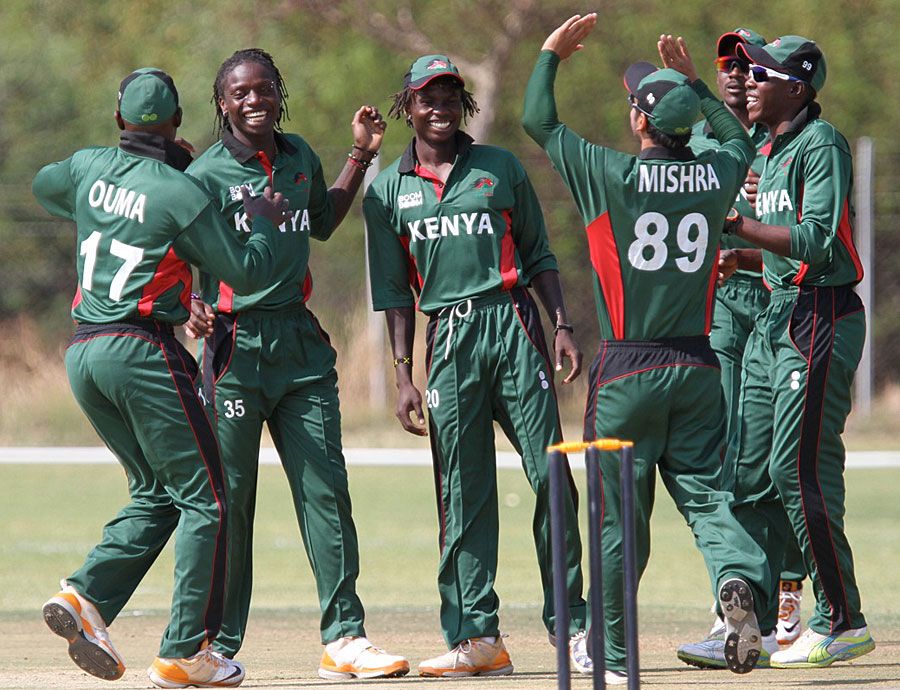 Nehemiah Odhiambo and his team-mates celebrate a wicket