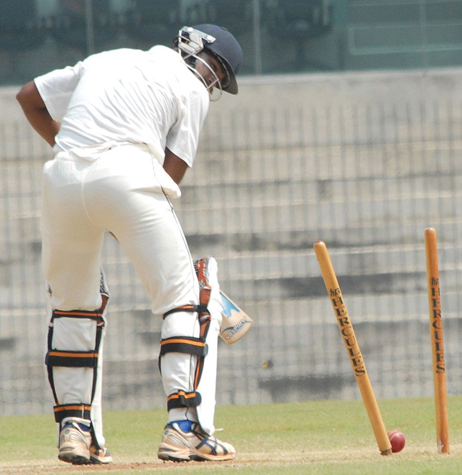Murtuja Vahora loses his middle stump to Rishi Dhawan