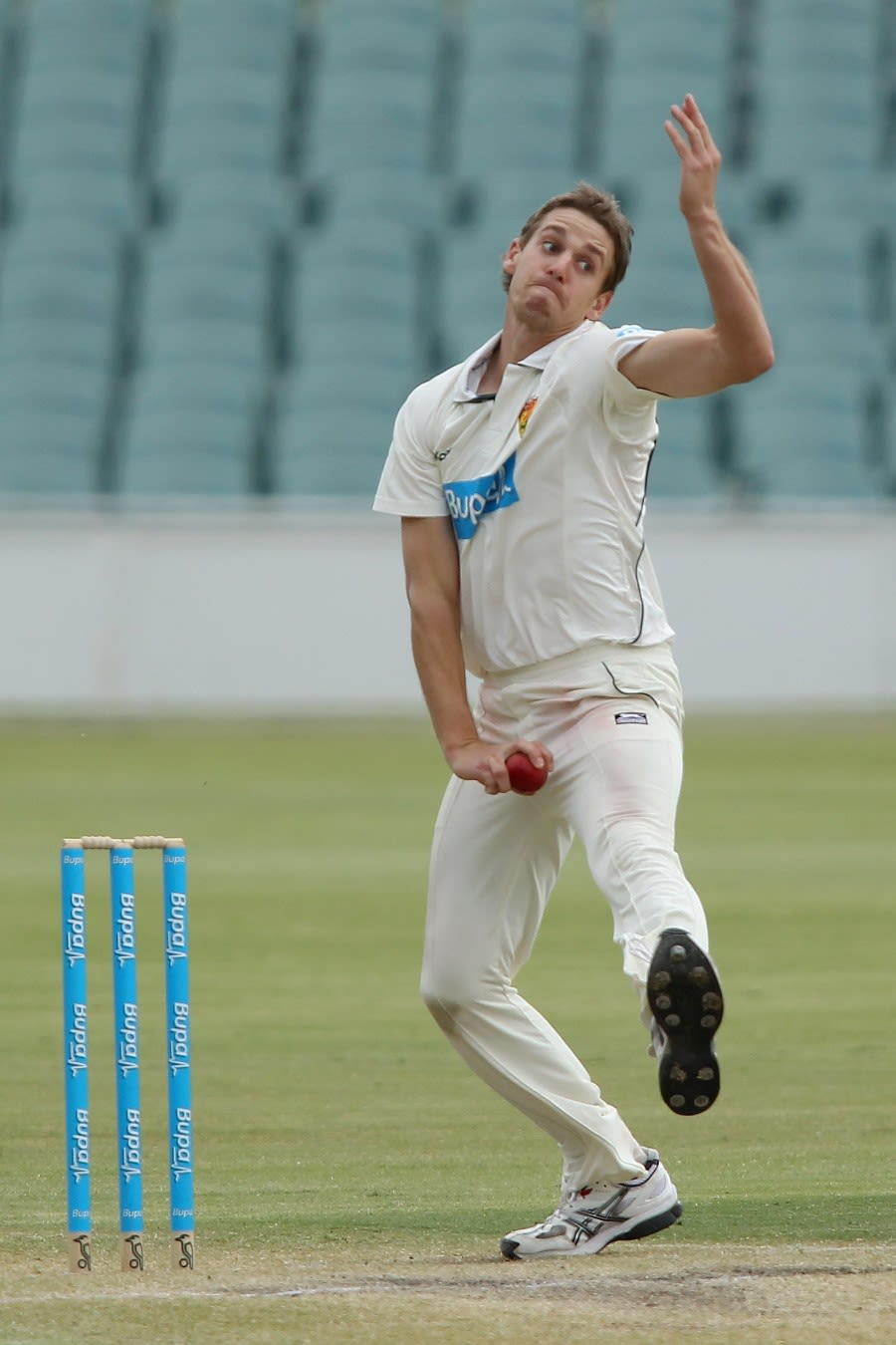 Luke Butterworth sends down a delivery