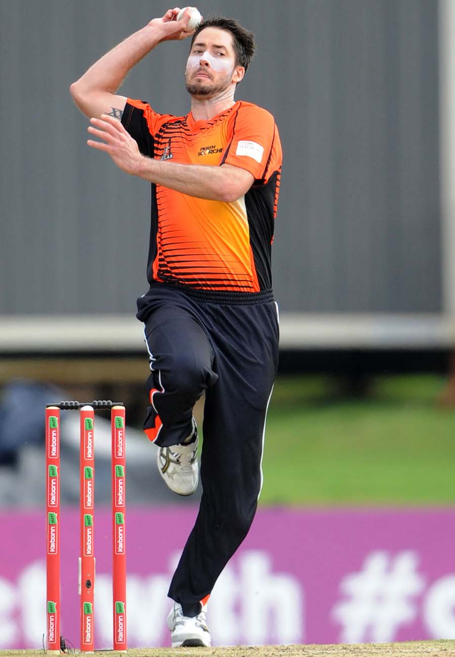 Ben Edmondson runs in to bowl