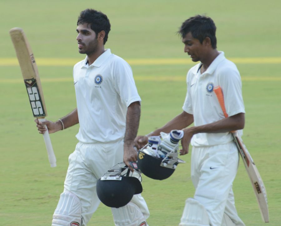 Bhuvneshwar Kumar and Rituraj Singh walk back at stumps after an unbeaten 100-run stand