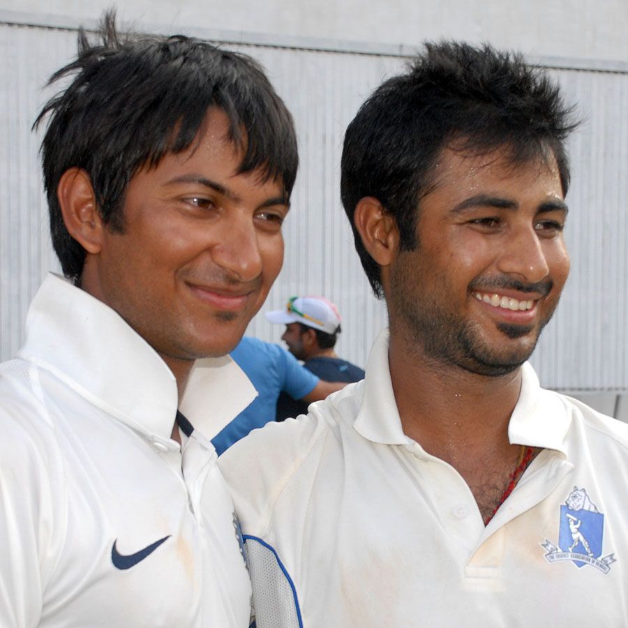 Iresh Saxena and Anustup Majumdar smile after East Zone's Duleep Trophy win
