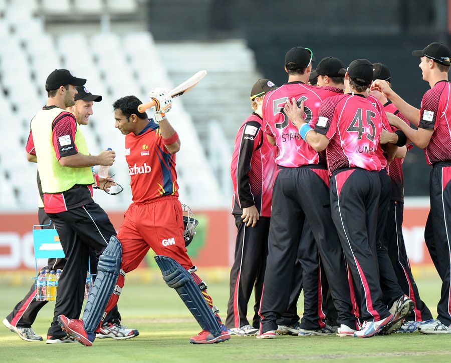 Gulam Bodi walks off disappointed after being dismissed in the first over