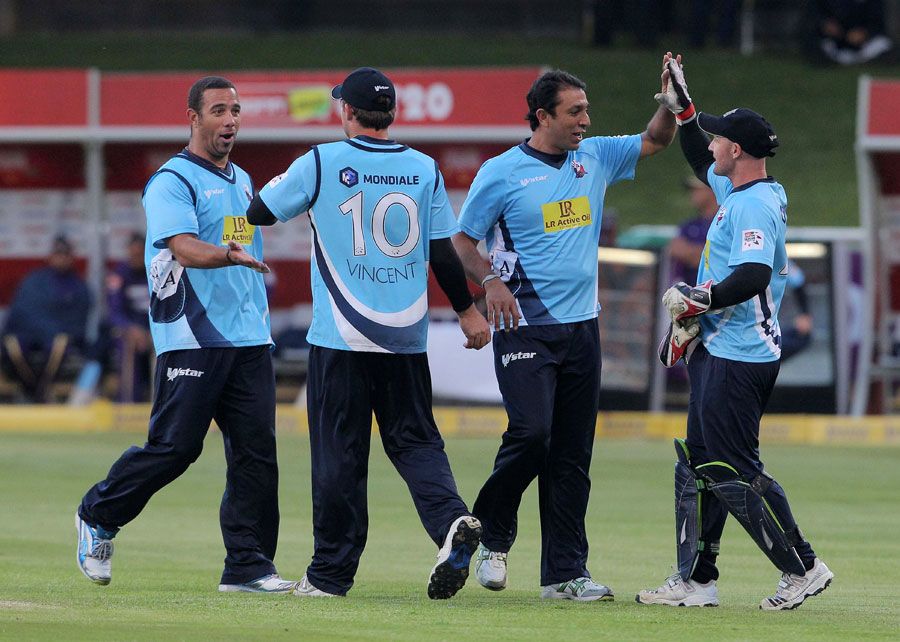 Auckland Aces celebrate a wicket