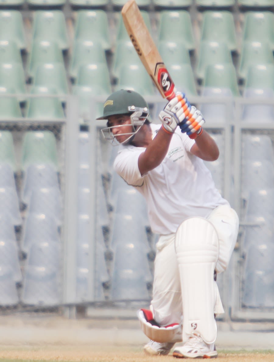 Mahesh Rawat drives enroute to his half-century
