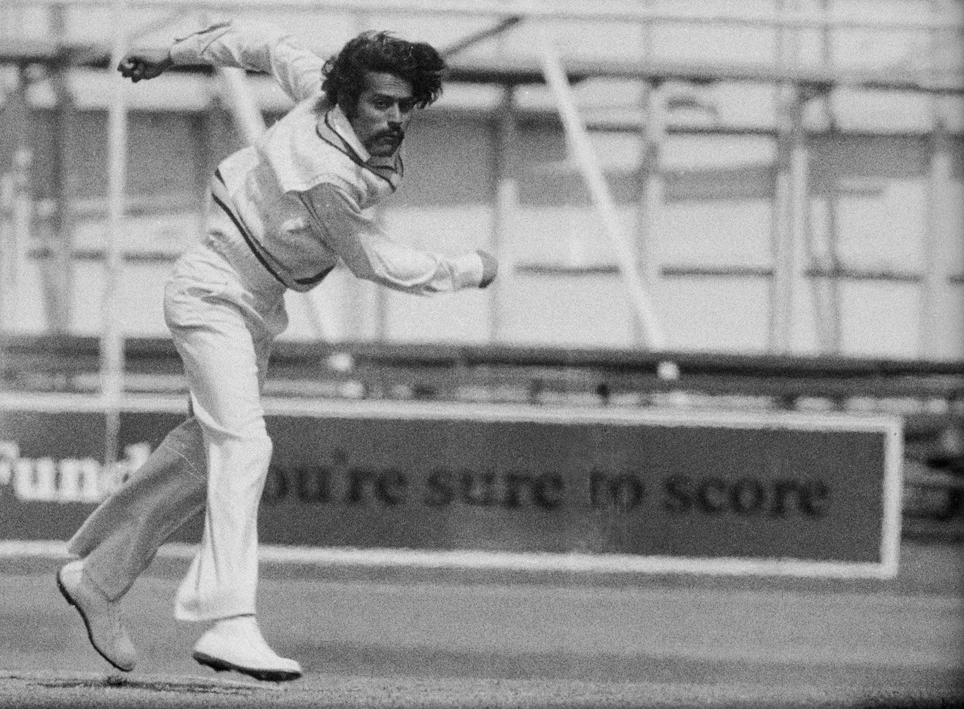 Bhagwath Chandrasekhar bowls