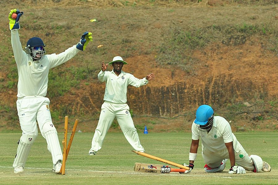 Assam captain Dheeraj Jadhav was run out for 98