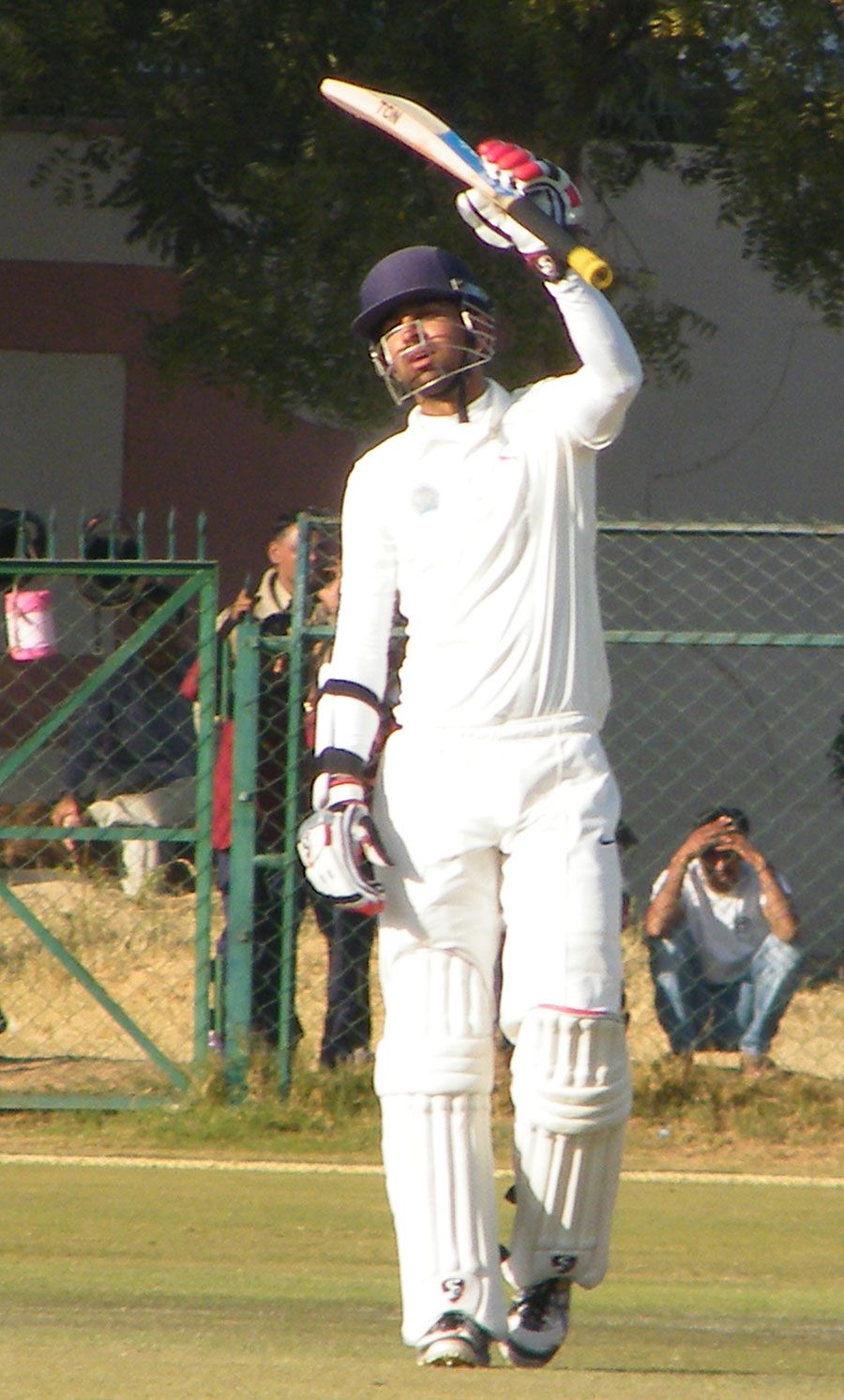 Ashok Menaria celebrates his century for Rajasthan