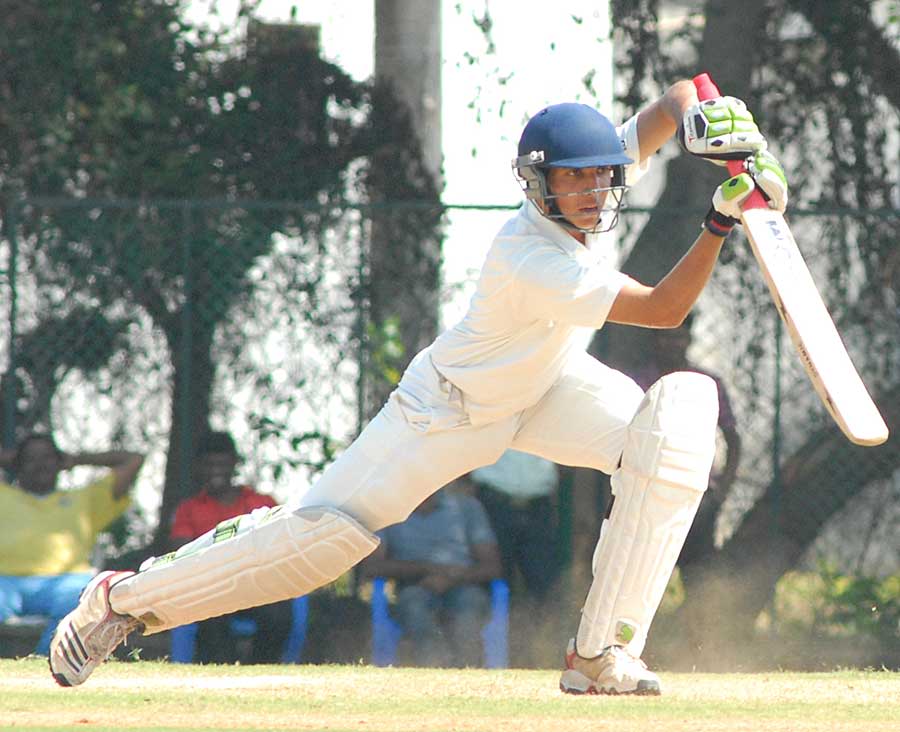 Rahul Dalal drives one through the off side