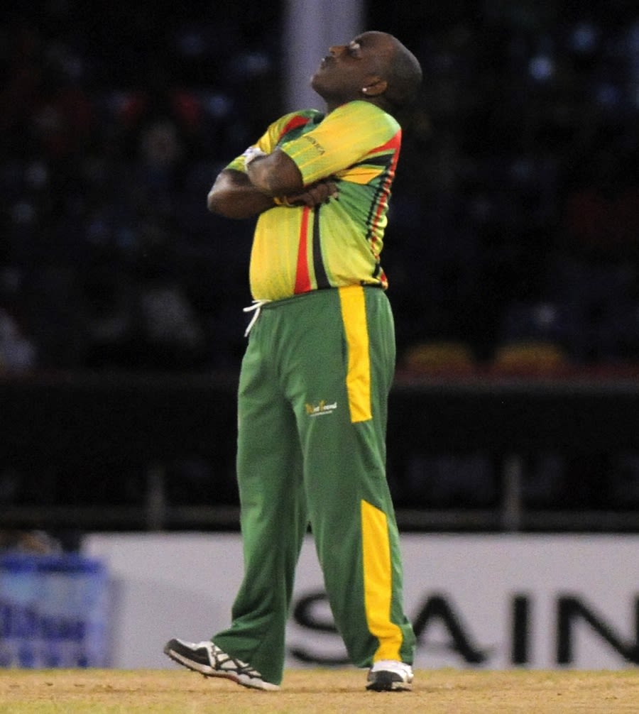 Liam Sebastien strikes a pose after taking a wicket