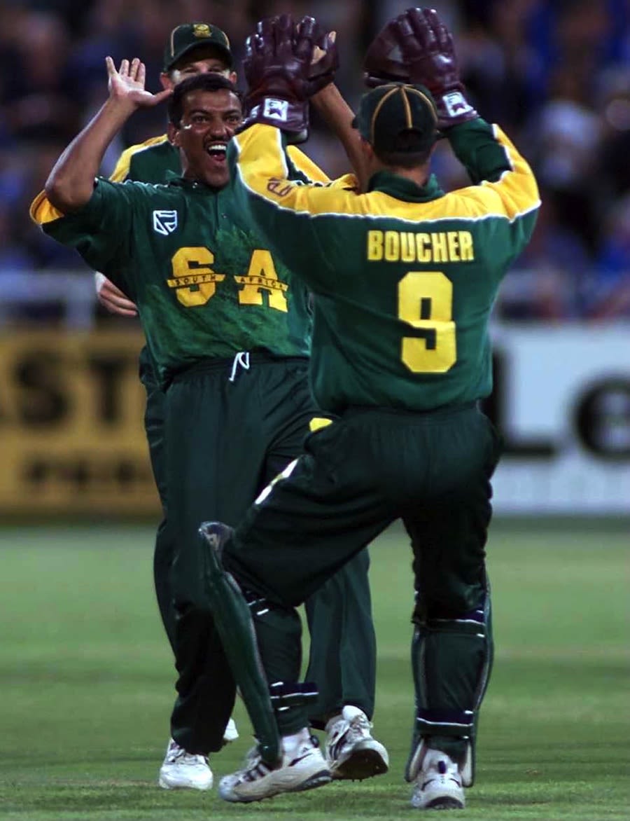 Henry Williams celebrates a wicket