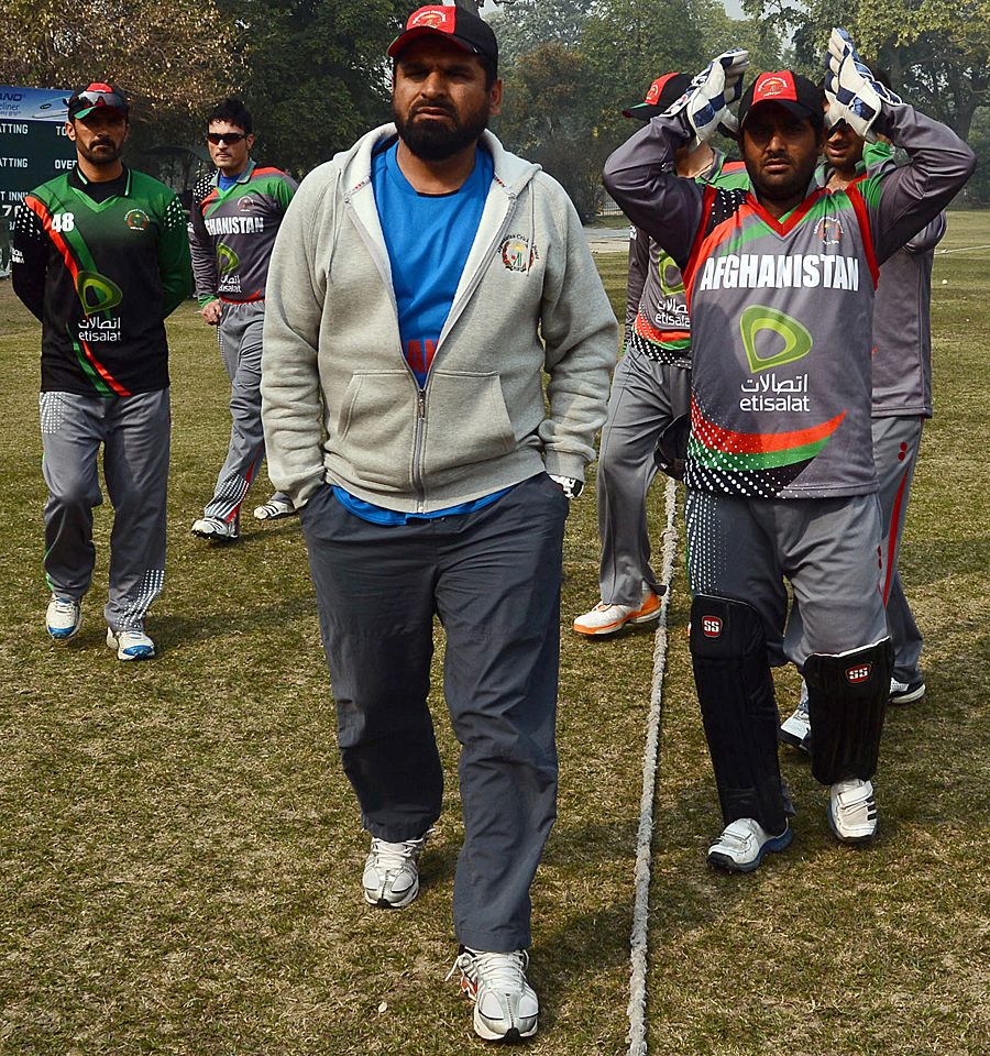 Afghanistan's coach Kabir Khan with players at a coaching camp
