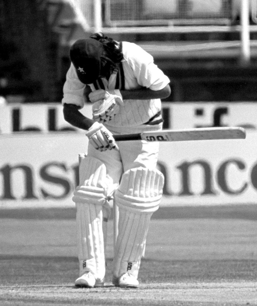 Iqbal Qasim recoils after being struck by a Bob Willis bouncer