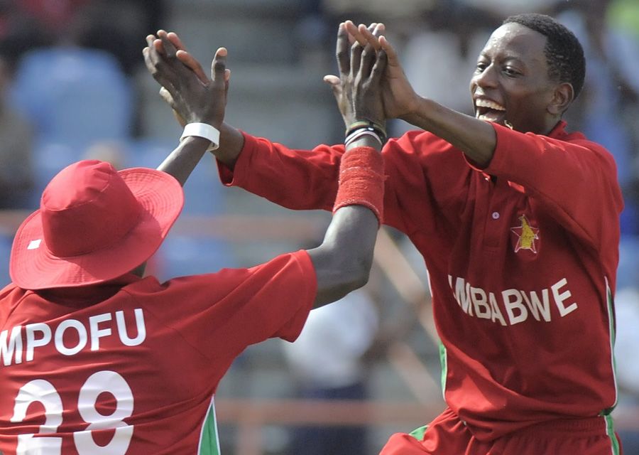 Tino Mutombodzi celebrates a wicket