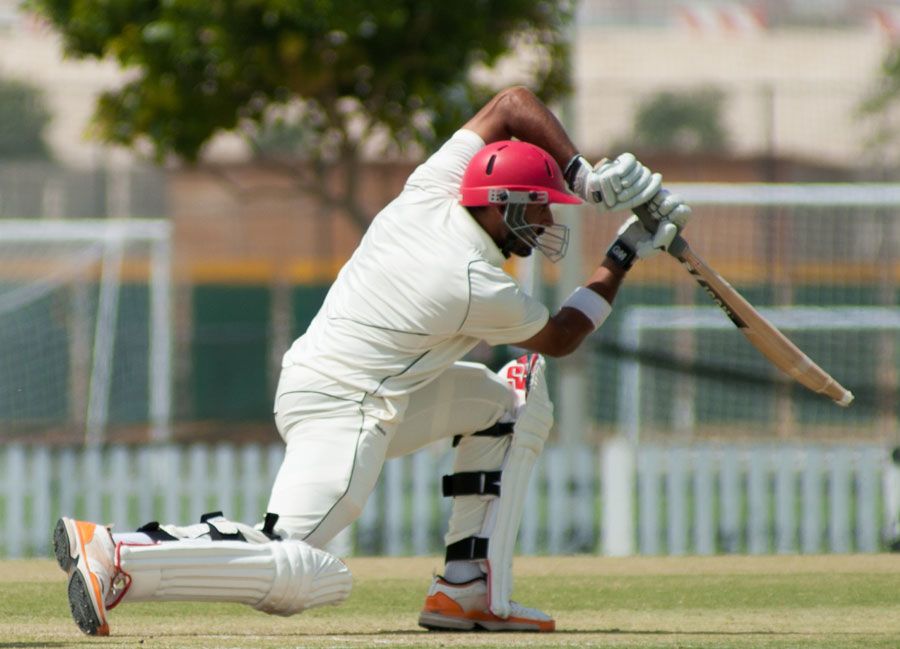 Raza-ur-Rehman drives through the covers