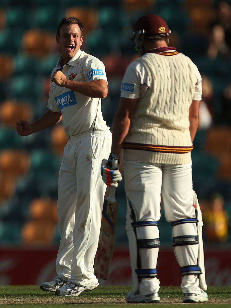 Evan Gulbis celebrates after dismissing Queensland batsman Peter Forrest