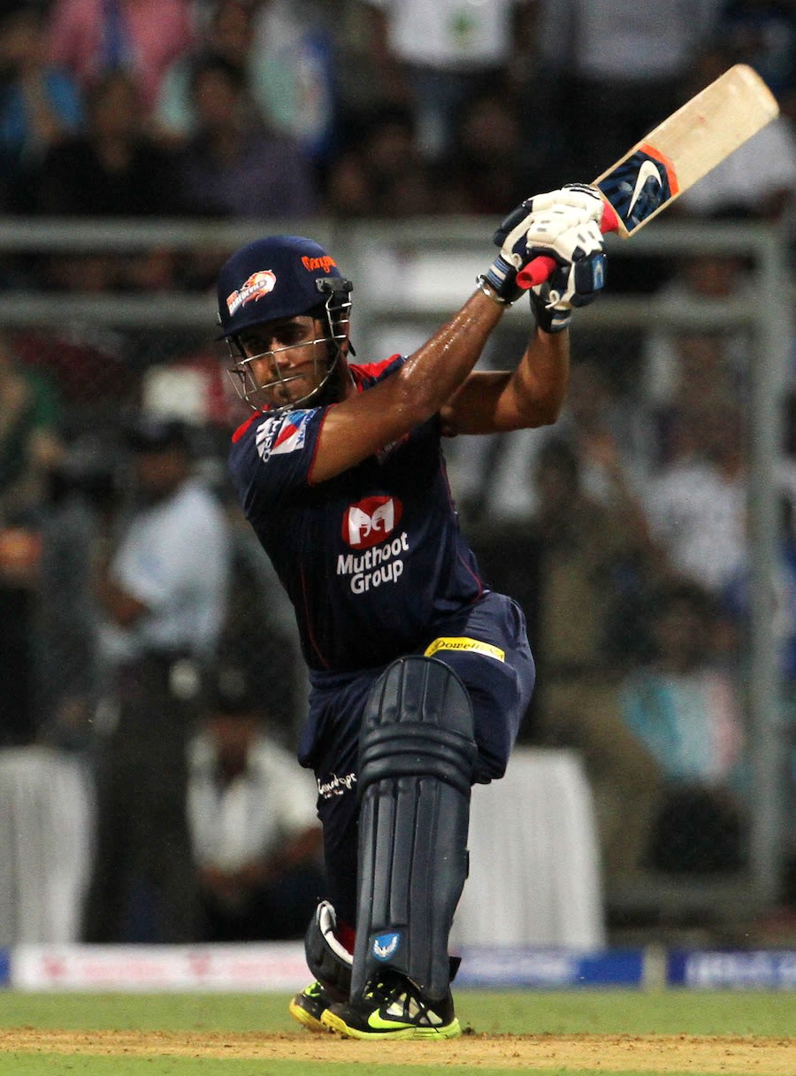 Manprit Juneja drives through the off side