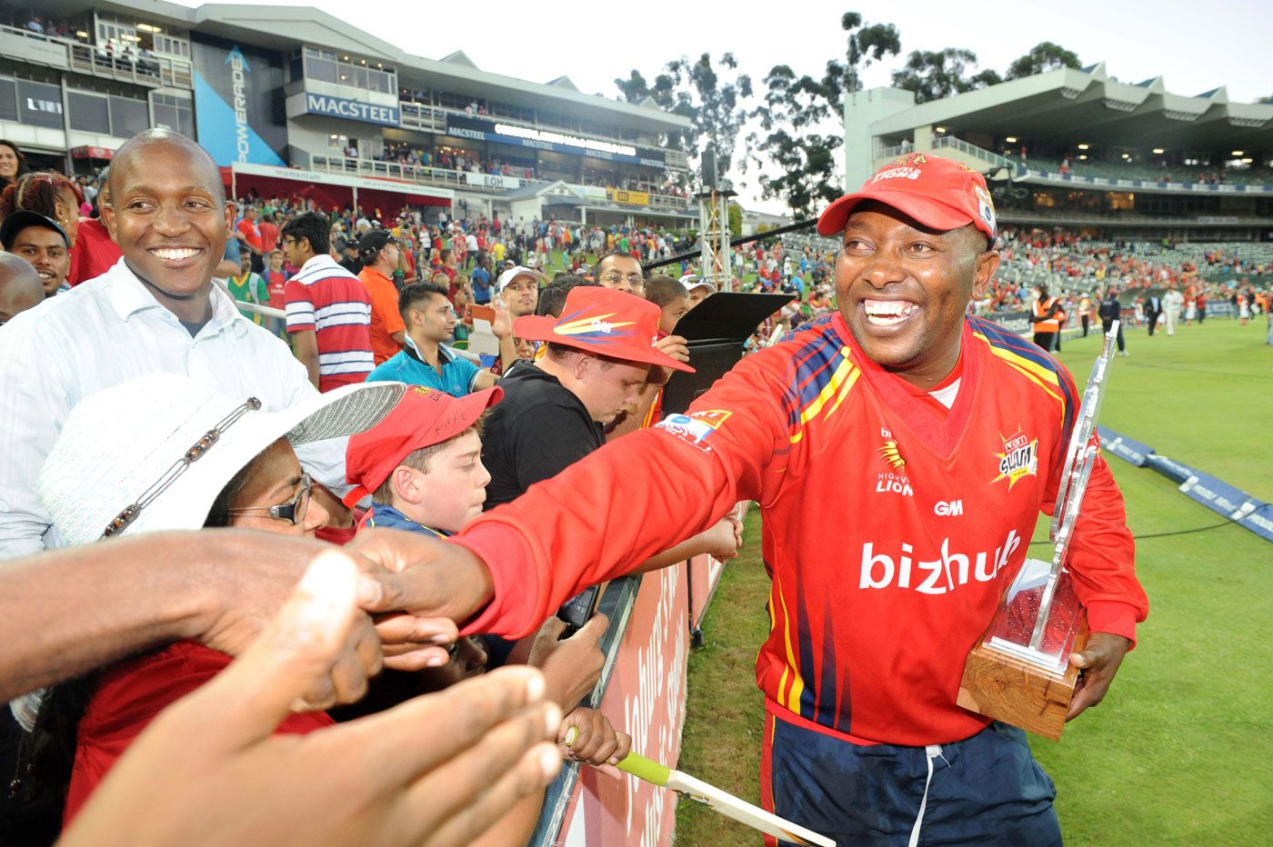 Fans congratulate Lions coach Geoff Toyana on the Twenty20 title win
