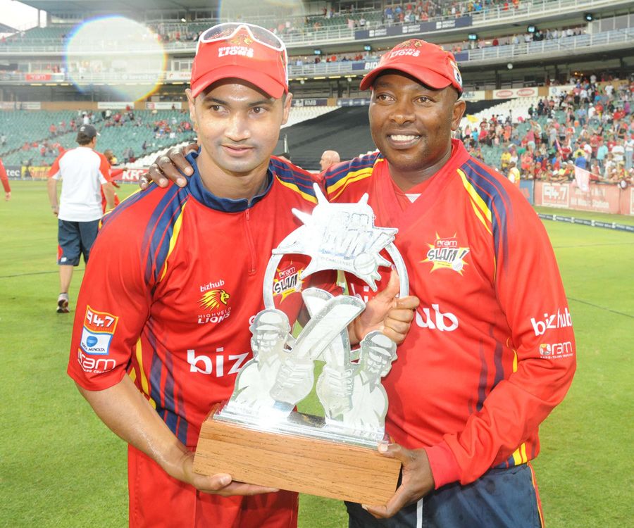 Lions captain Alviro Petersen and coach Geoff Toyana hold the Twenty20 trophy