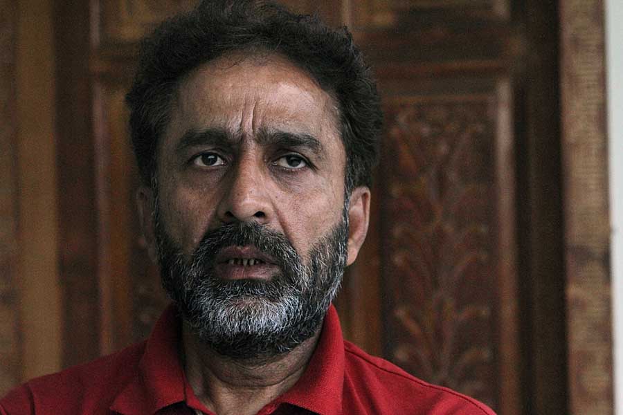 Nadeem Ghauri, the Pakistan umpire who was banned the PCB for four years, speaks to the press in Lahore
