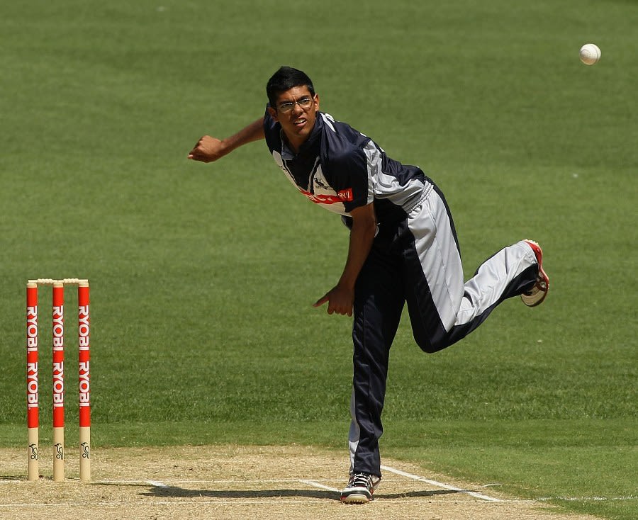 Clive Rose sends down a delivery