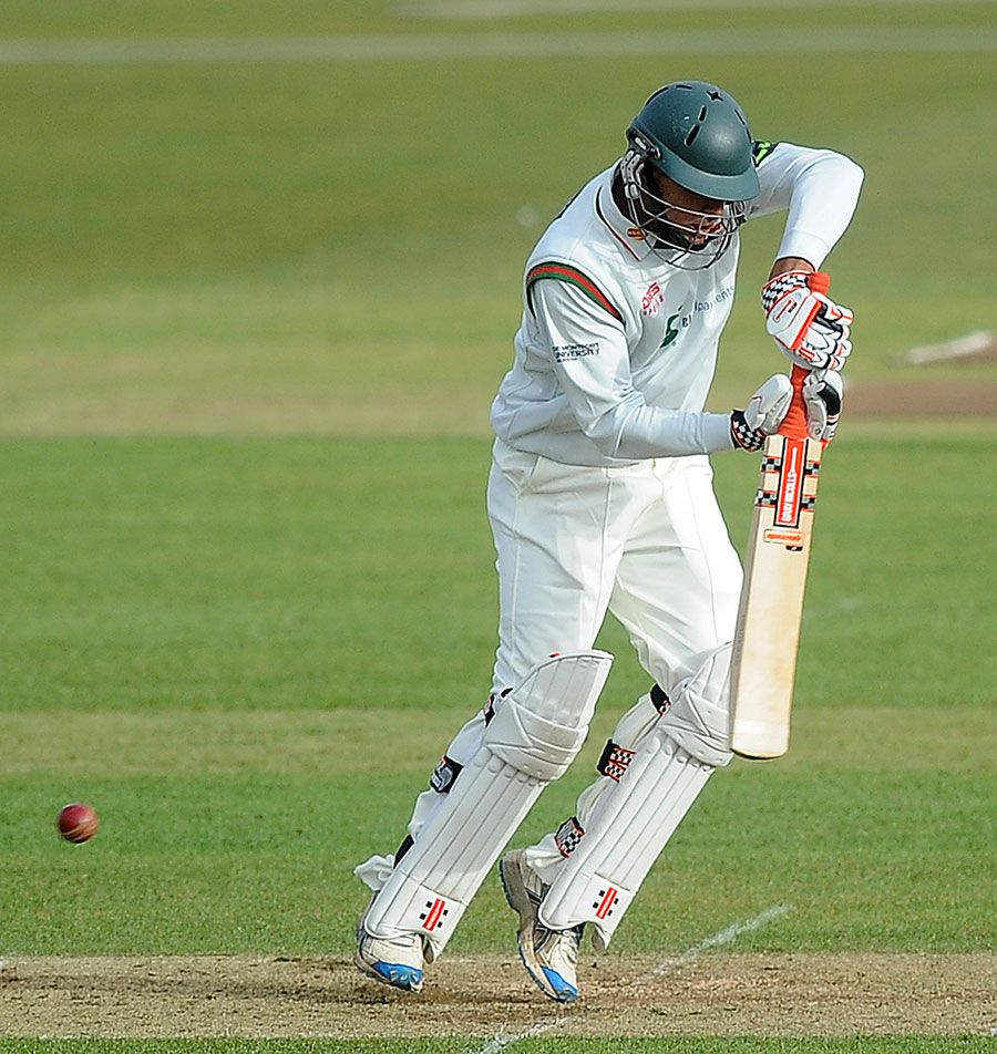 Shiv Thakor drops the ball into the off side