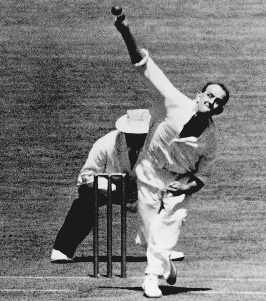 Frank Tyson bowls in a tour game