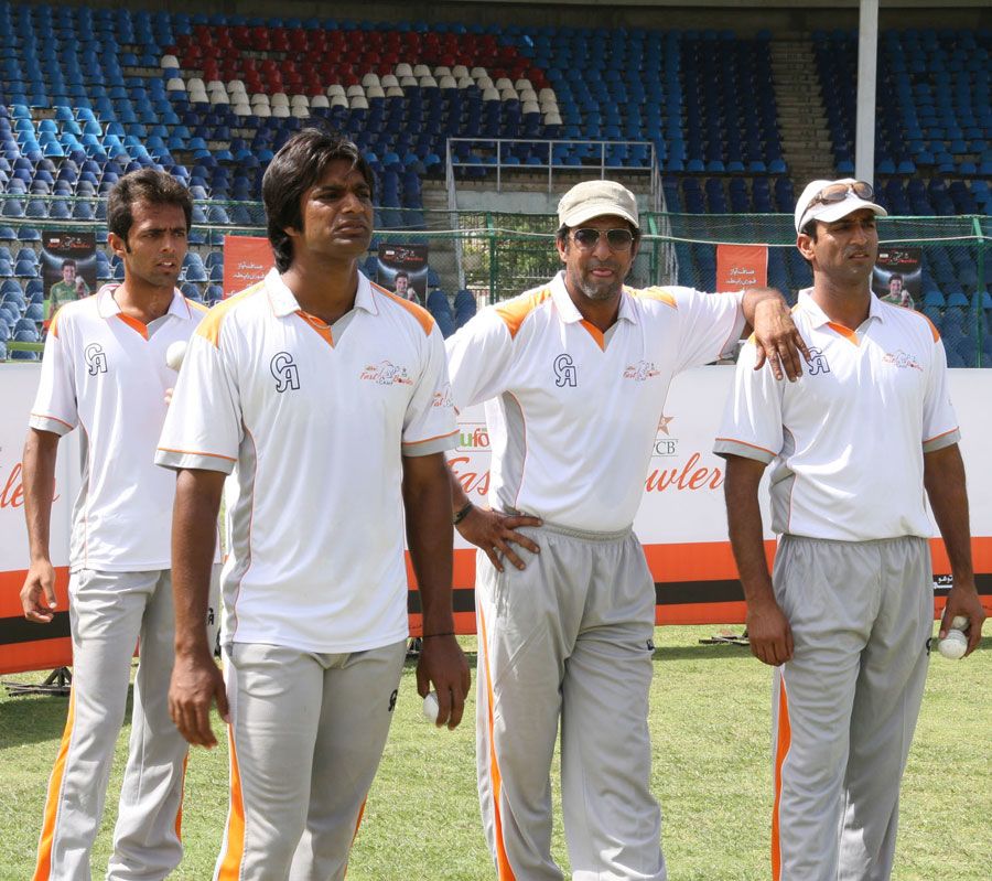Wasim Akram leans on Mohammad Akram during the fast bowling camp