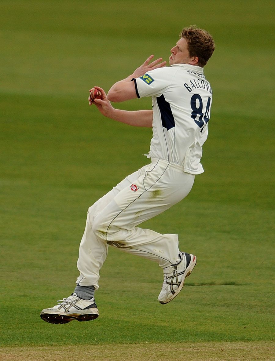 David Balcombe approaches the crease to bowl