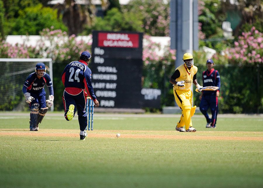 Pradeep Airee runs in to field the ball