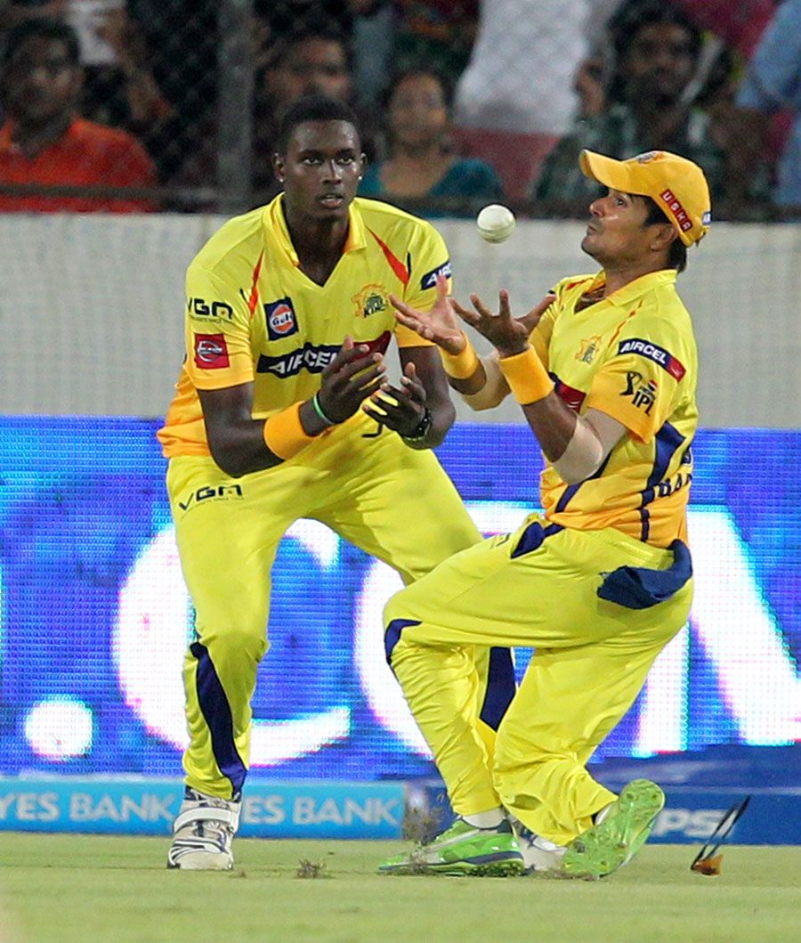 S Badrinath juggles to hold on to a catch to dismiss Thisara Perera
