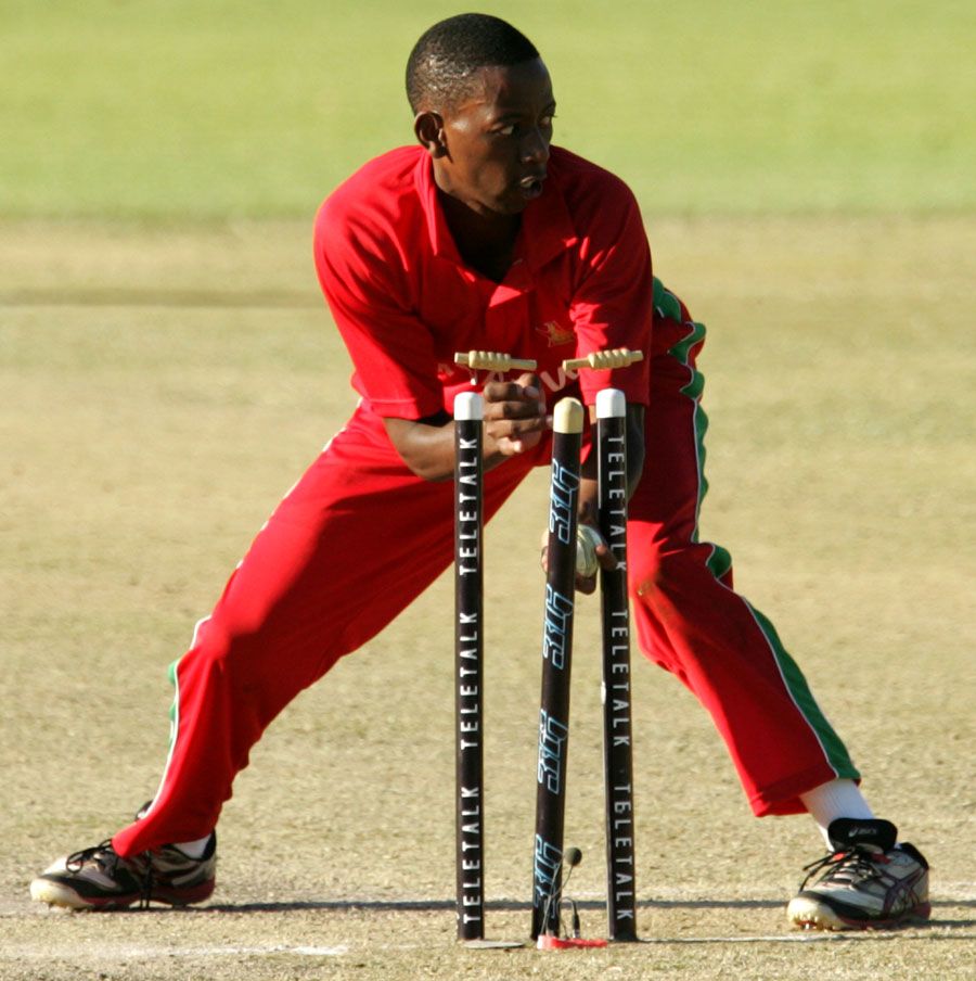 Titotenda Mutombodzi runs out Nasir Hossain