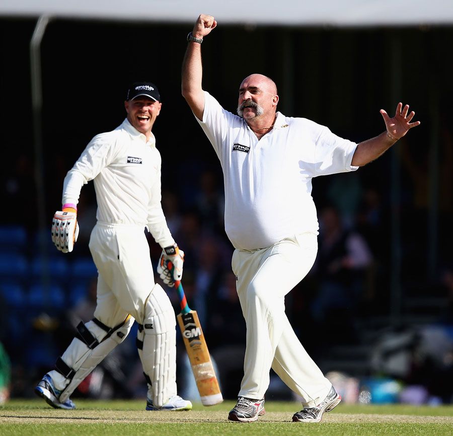 Merv Hughes celebrates a hat-trick at a charity T20 match