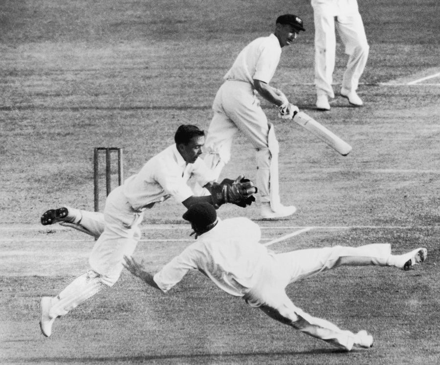Denis Lindsay dives to catch Brian Booth for 58 off the bowling of Trevor Goddard