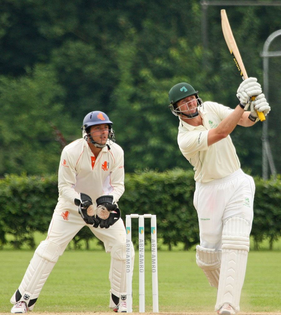 Andrew White plays a lofted shot in his innings of 62