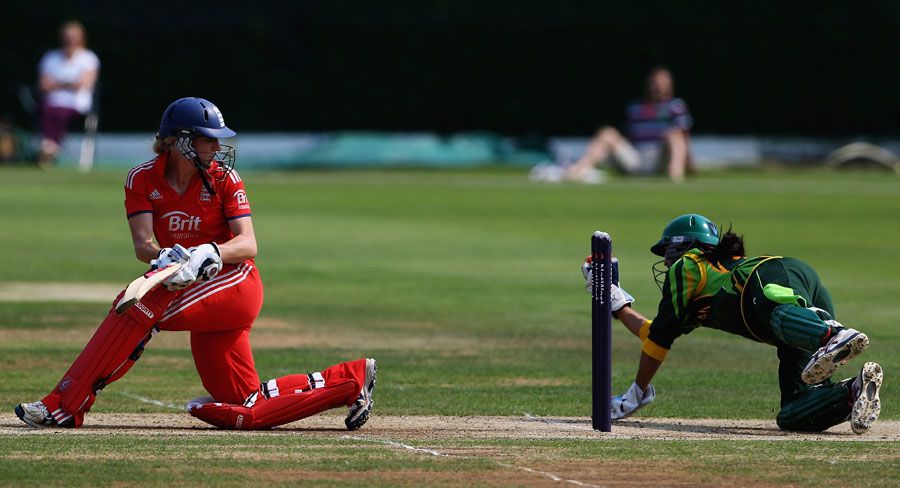 Susie Rowe looks on as Pakistan keeper Batool Fatima takes a catch