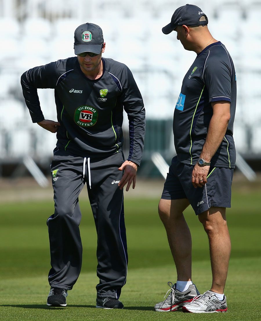Michael Clarke talks to Australia's physiotherapist, Alex Kontouris