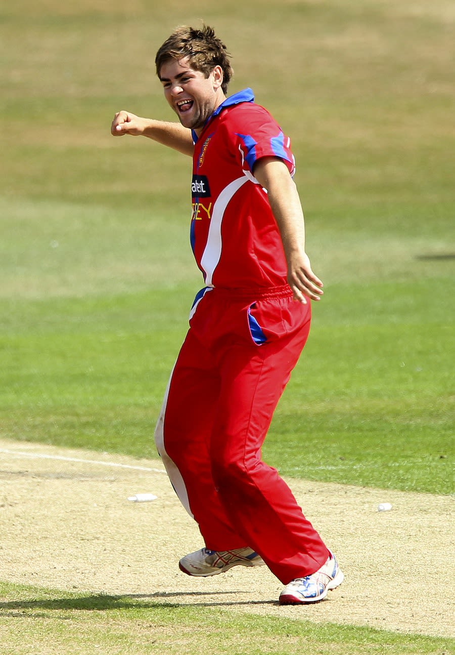 Charles Perchard is jubilant after a wicket
