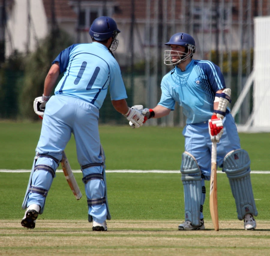 Pablo Ferguson is congratulated after reaching his fifty