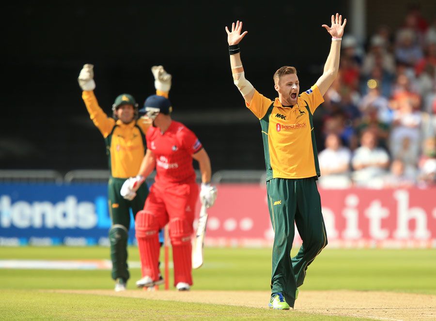 Graeme White celebrates having Steven Croft lbw
