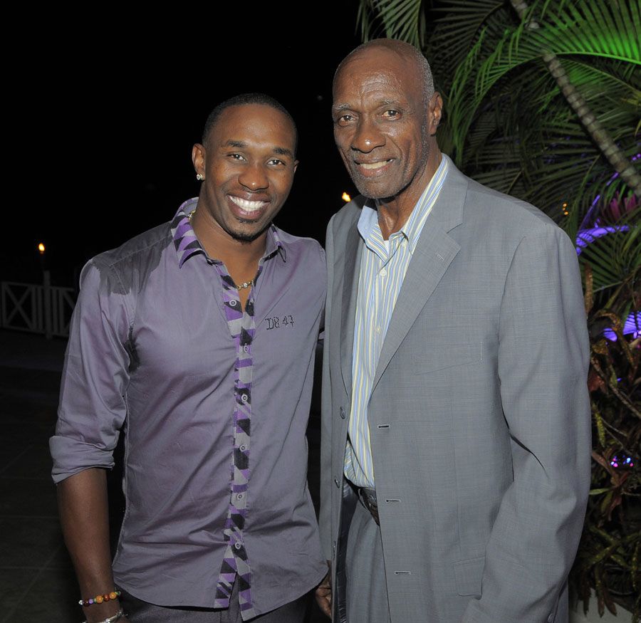 Dwayne Bravo poses with Sir Wes Hall