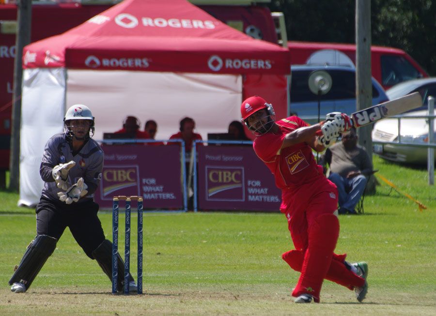 Hiral Patel lofts the ball during his half-century