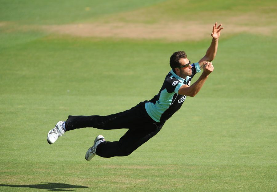 Tom Jewell dives to take a flying catch to dismiss Peter Burgoyne