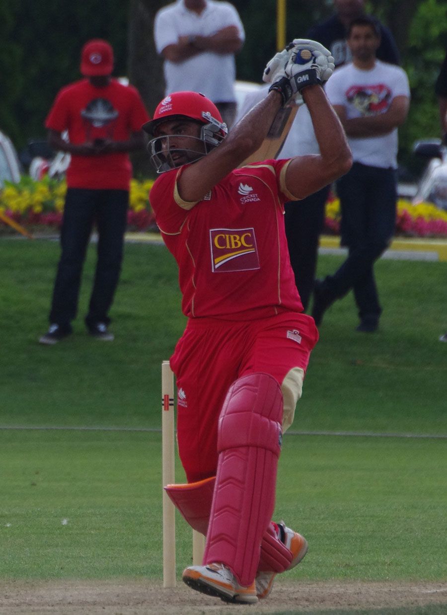Raza-ur-Rehman lofts the ball straight 